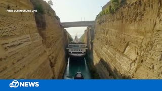 Cruise ship makes tight squeeze through canal [upl. by Airdua314]